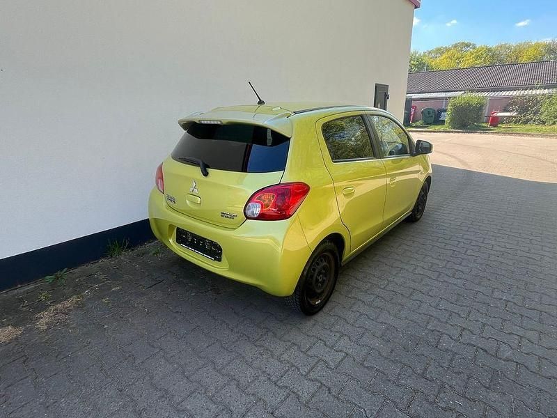 Gebraucht Mitsubishi Space Star 80 PS (58 kW) 2014 Gelb Van / Kleinbus