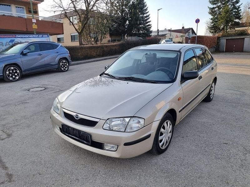 Second-hand Mazda 323 88 CP (64 kW) 1998 Gri Berlinǎ