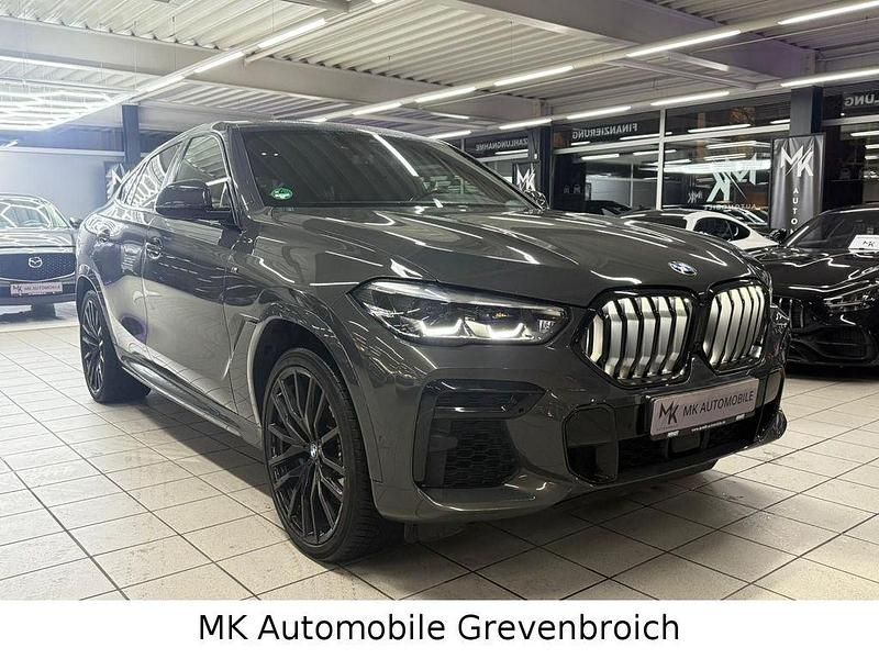 Grau Gebraucht 2021 BMW X6 M50 M Sport SUV | 56.998 € (Superpreis) - Bild 1/4
