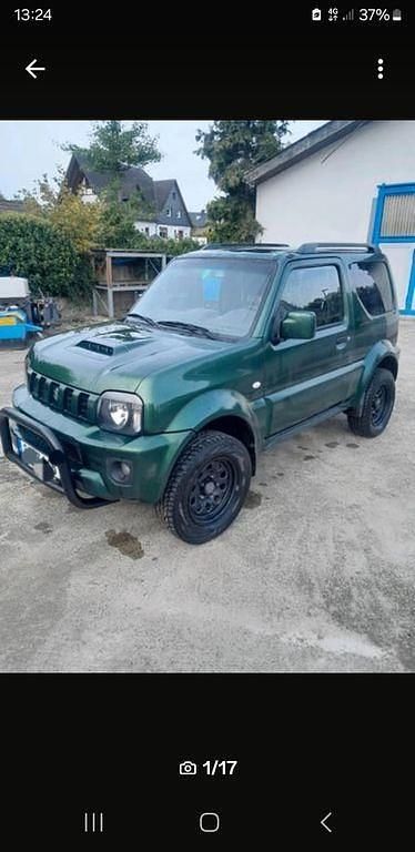 Grün Gebraucht 2014 Suzuki Jimny Comfort SUV | 13.500 € (Etwas zu teuer) - Bild 1/4