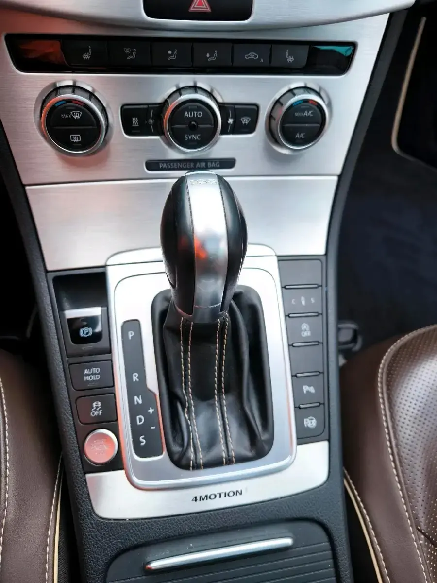 Używany VW Passat Exclusive 177 KM (130 kW) 2014 Brązowy Kombi