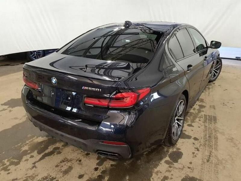 Gebraucht BMW M550 Performance 530 PS (389 kW) 2022 Carbonschwarz met. Limousine