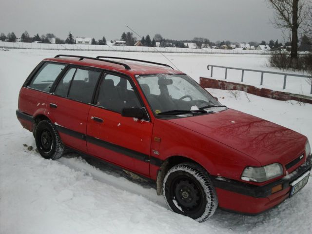 Мазда 323 glx
