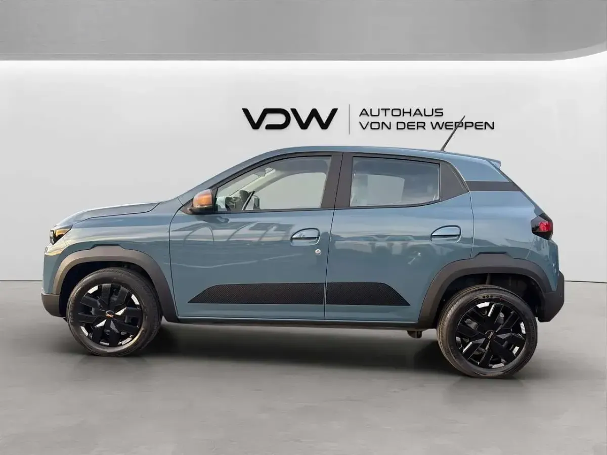 Gebraucht Dacia Spring Extreme 47 kW (65 PS) 2025 Schiefer blau Kleinwagen