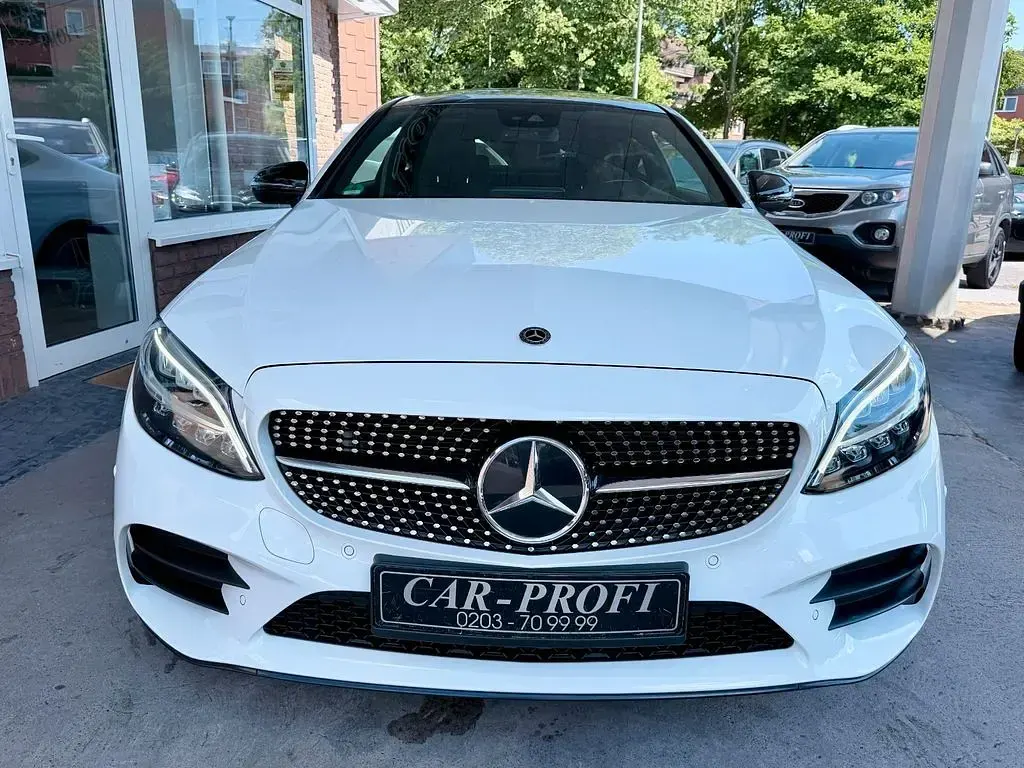 Gebraucht Mercedes C200 AMG 184 PS (135 kW) 2020 Polarweiss  unilack Coupé