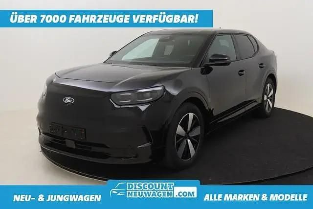 Agate black metallic Gebraucht 2024 Ford Capri Extended Range SUV | 39.047 € - Bild 1/4
