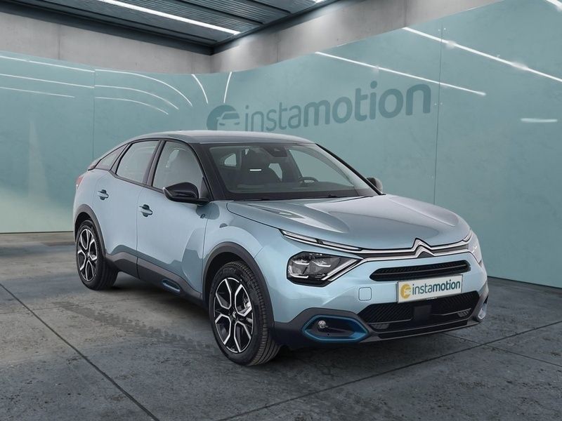 Blau Neu 2024 Citroën e-C4 Feel Limousine | 27.270 € (Teuer) - Bild 1/4