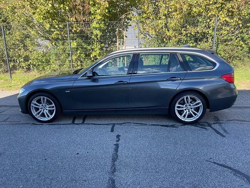 Grau Gebraucht 2013 BMW 330 Performance Kombi | 12.800 € (Superpreis) - Bild 1/4