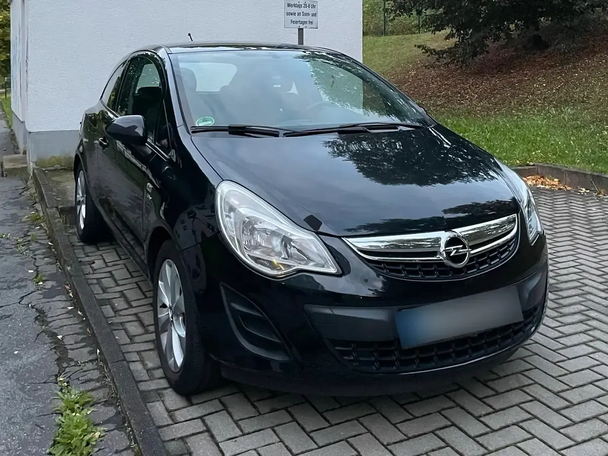 Gebraucht Opel Corsa Active 69 PS (50 kW) 2013 Schwarz Kleinwagen