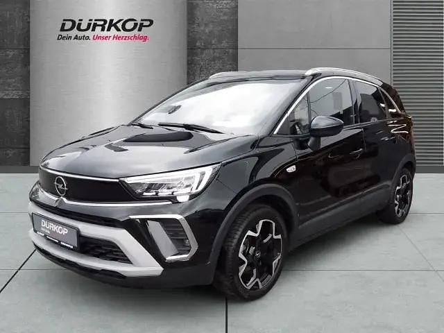 Karbon schwarz (metallic) Gebraucht 2024 Opel Crossland Ultimate SUV | 21.990 € (Fairer Preis) - Bild 1/4