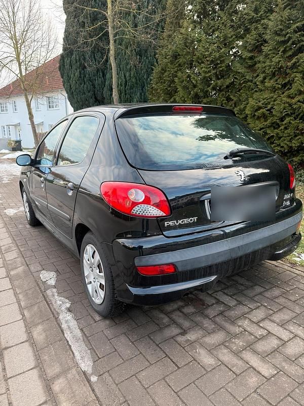 Gebraucht Peugeot 206+ 75 PS (55 kW) 2011 Schwarz Kleinwagen