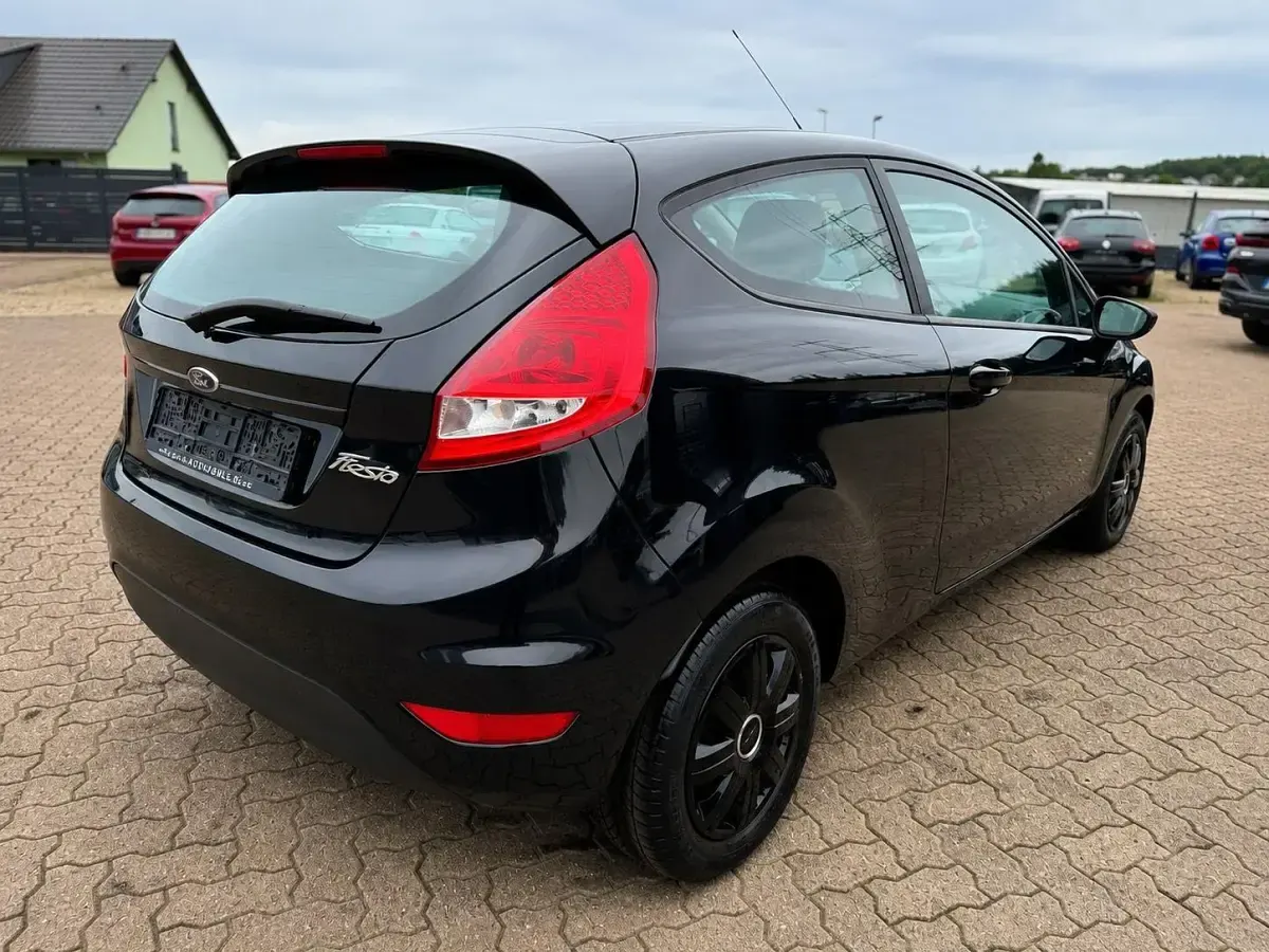 Gebraucht Ford Fiesta 60 PS (44 kW) 2012 Schwarz Limousine