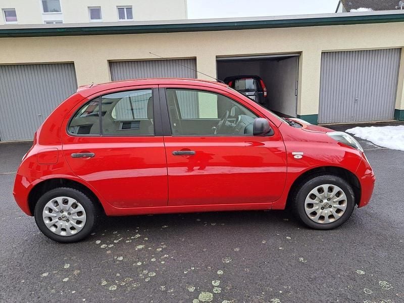 Gebraucht Nissan Micra 65 PS (47 kW) 2010 Rot Kleinwagen