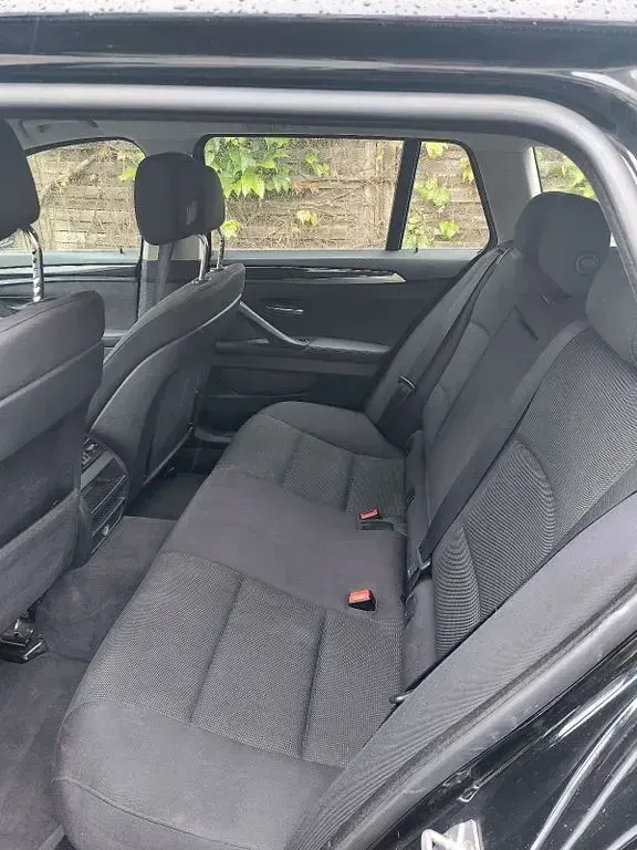 Gebraucht BMW 520 184 PS (135 kW) 2011 Schwarz Kombi