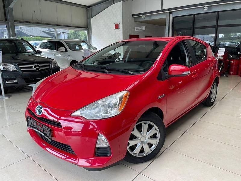 Rot Gebraucht 2013 Toyota Prius c Kleinwagen | 8.991 € - Bild 1/4