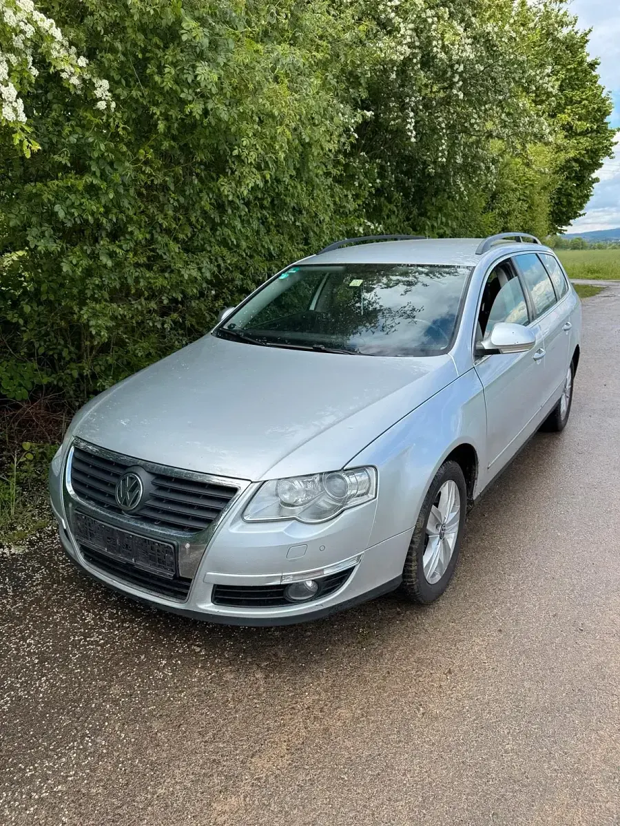 Second-hand VW Passat 140 CP (102 kW) 2011 Argintiu Break