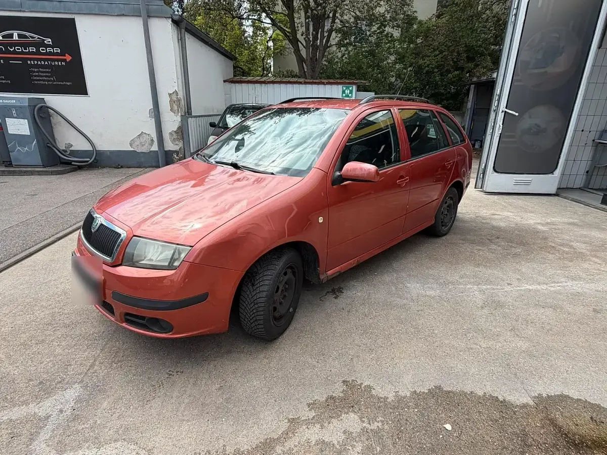 Używany Skoda Fabia 80 KM (58 kW) 2006 Pomarańczowy Kombi