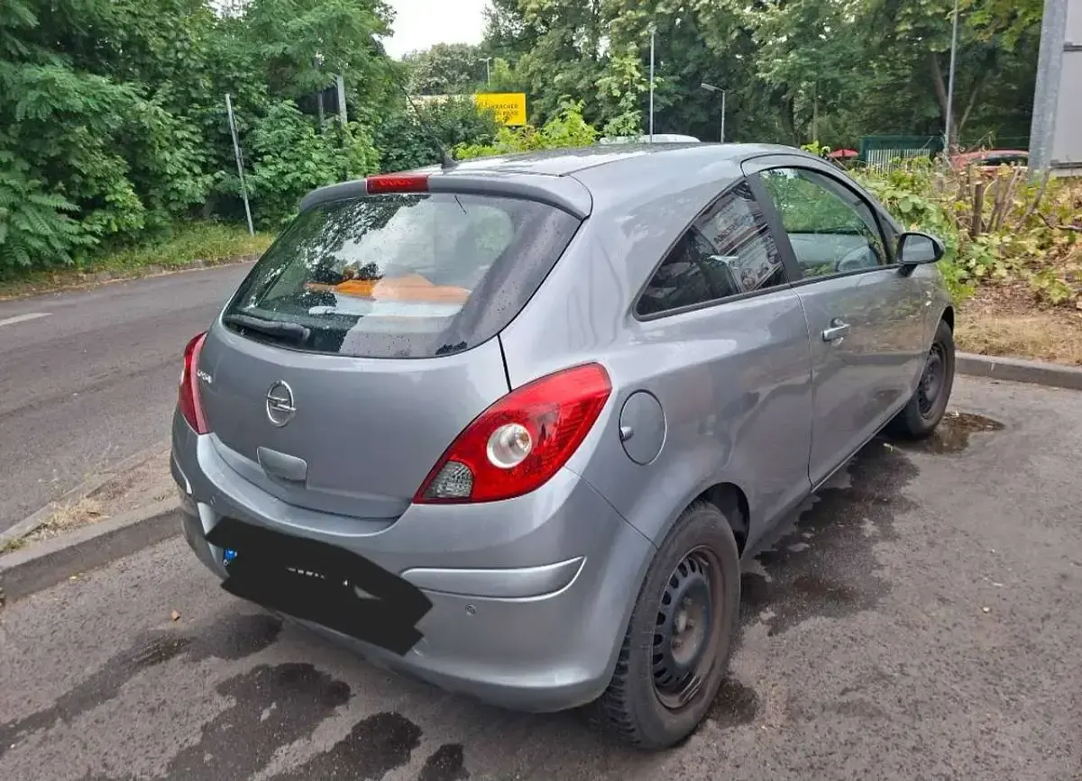 Gebraucht Opel Corsa Active 87 PS (63 kW) 2013 Silber Kleinwagen