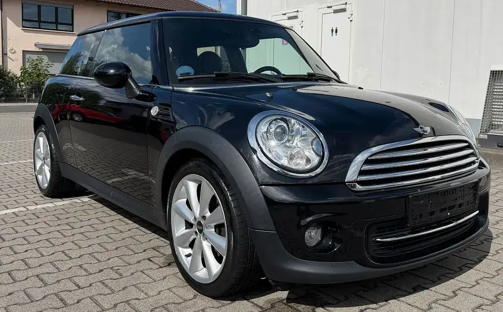 Gebraucht Mini Cooper 122 PS (89 kW) 2013 Midnight black metallic Kleinwagen