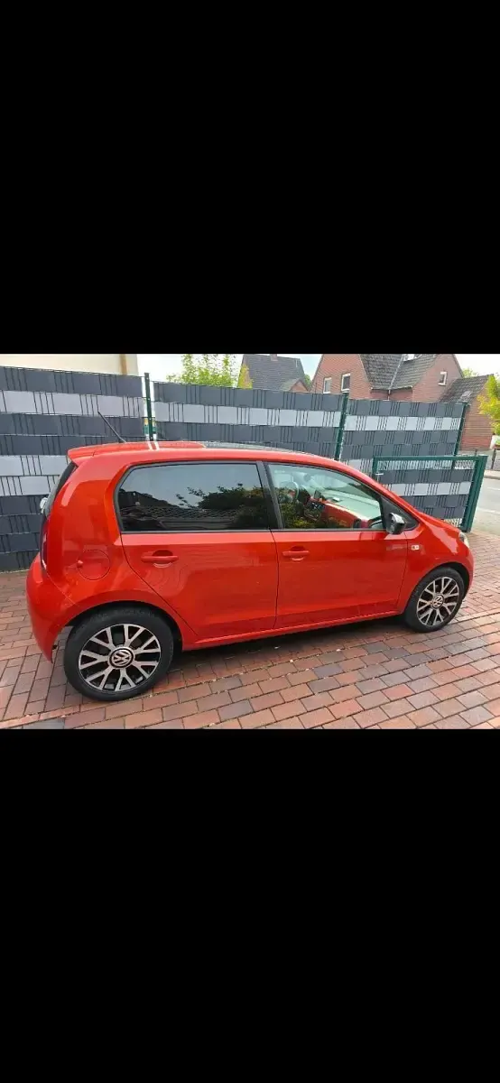 Używany VW up! 75 KM (55 kW) 2014 Pomarańczowy Hatchback