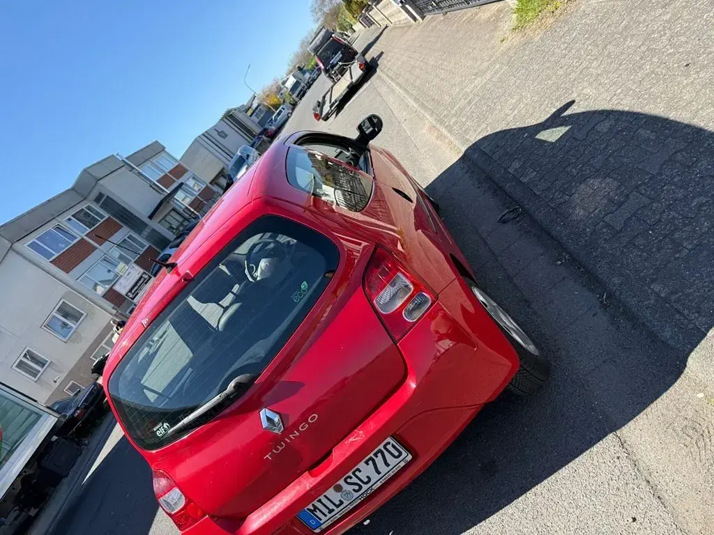 Używany Renault Twingo 58 KM (42 kW) 2011 Czerwony Hatchback