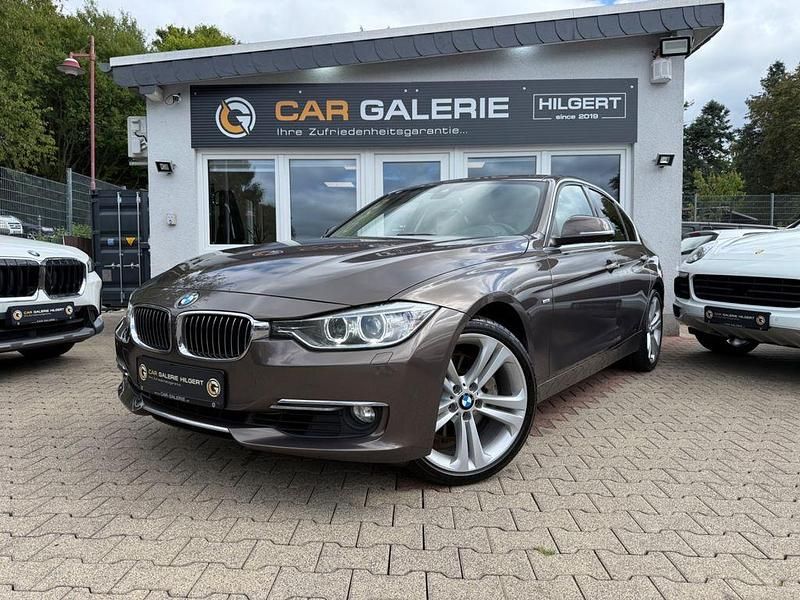Braun Gebraucht 2012 BMW 335 Luxury Line Limousine | 16.290 € (Guter Preis) - Bild 1/4
