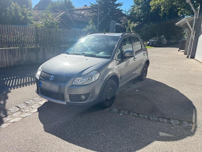Grau Gebraucht 2007 Suzuki SX4 Comfort SUV | 1.000 € (Superpreis) - Bild 1/4