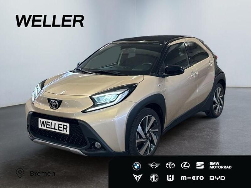Ginger beige / night sky black Gebraucht 2023 Toyota Aygo Kleinwagen | 17.980 € (Fairer Preis) - Bild 1/3