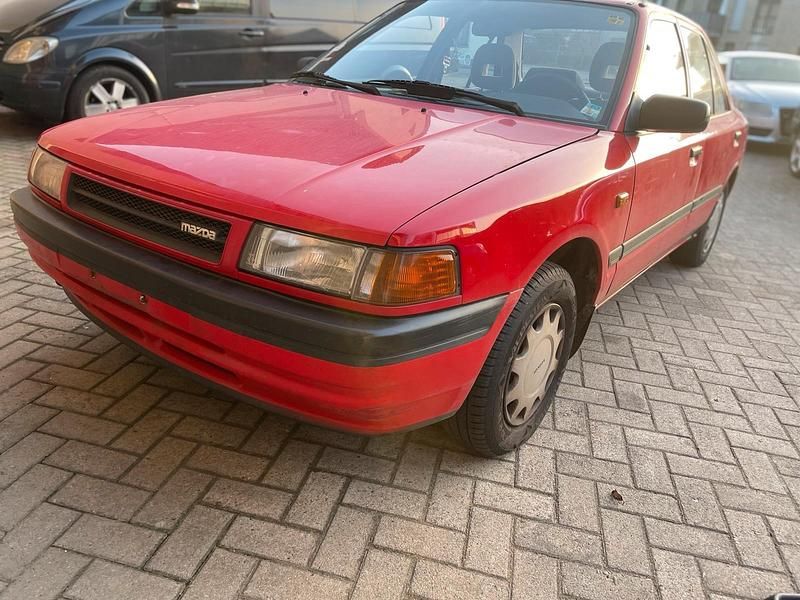 Gebraucht Mazda 323 88 PS (64 kW) 1991 Rot Limousine