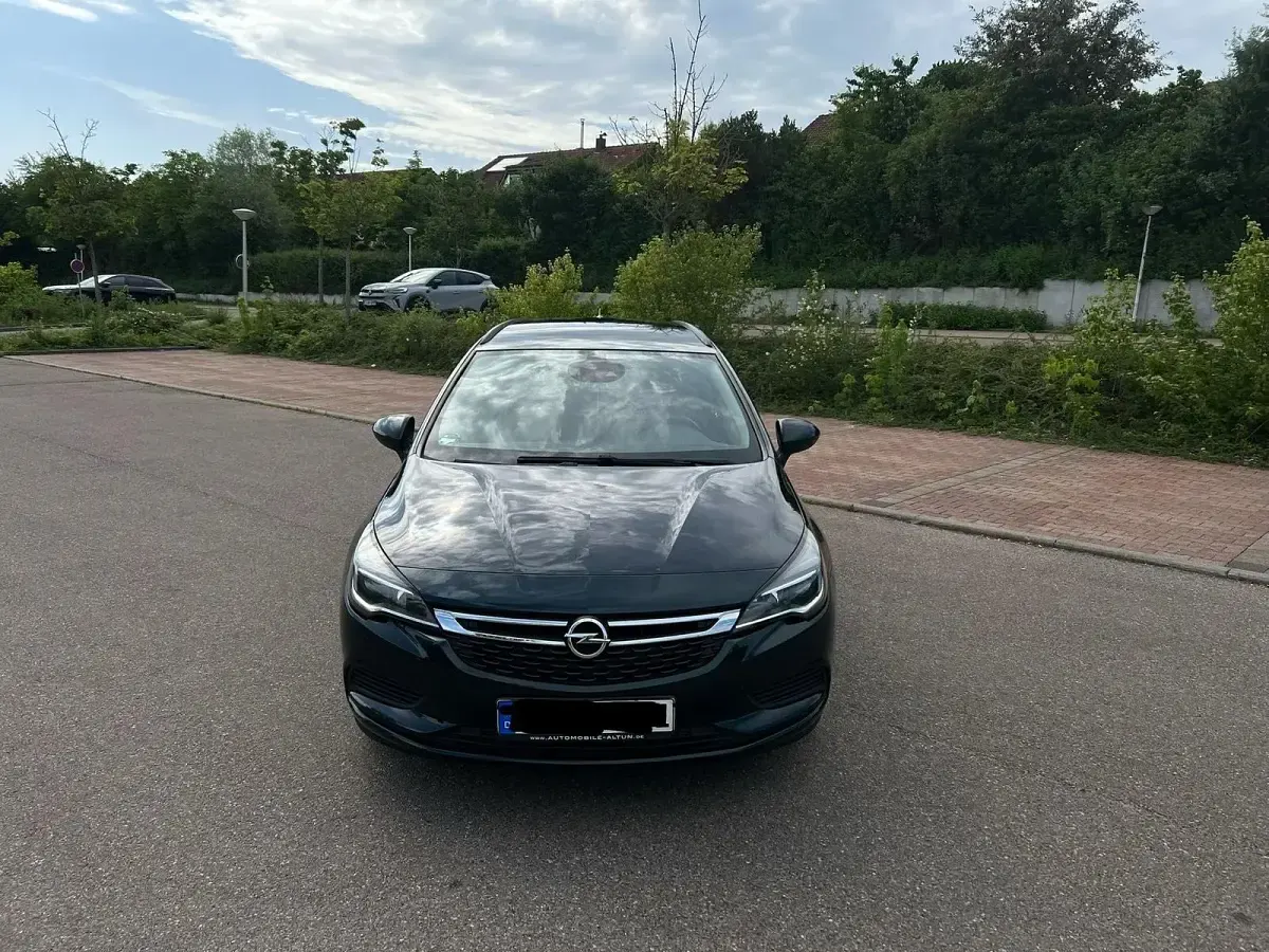 Gebraucht Opel Astra 110 PS (80 kW) 2016 Grün Kombi