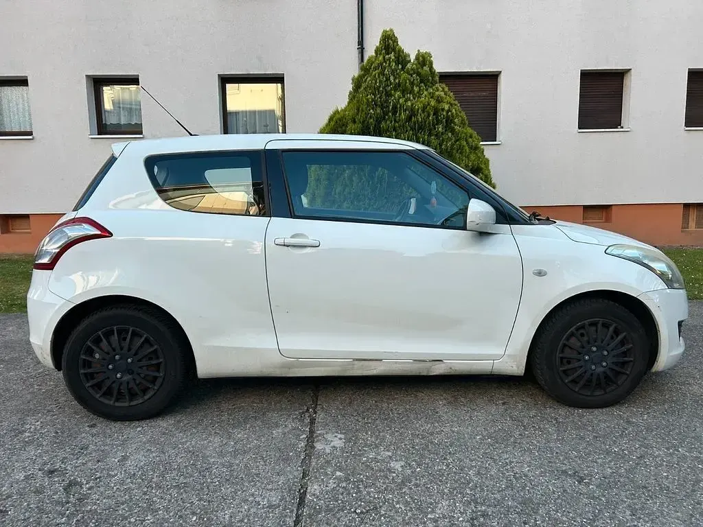 Usado Suzuki Swift 94 CV (69 kW) 2011 Blanco Utilitario