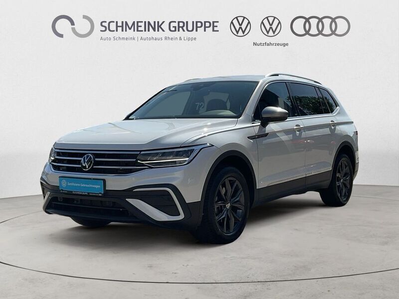 Oryxweiß perlmutteffekt Gebraucht 2024 VW Tiguan Allspace Move SUV | 34.880 € (Fairer Preis) - Bild 1/4