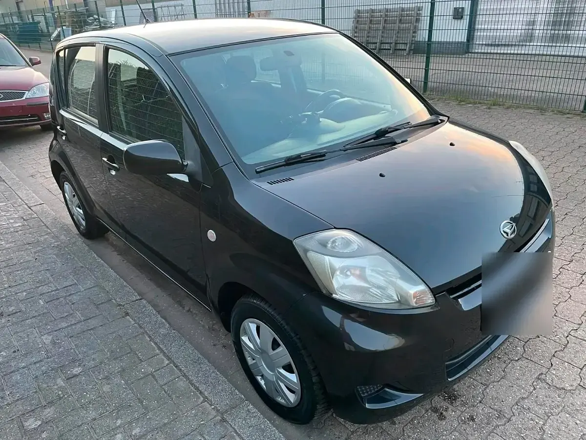 Gebraucht Daihatsu Sirion 70 PS (51 kW) 2010 Schwarz Kleinwagen