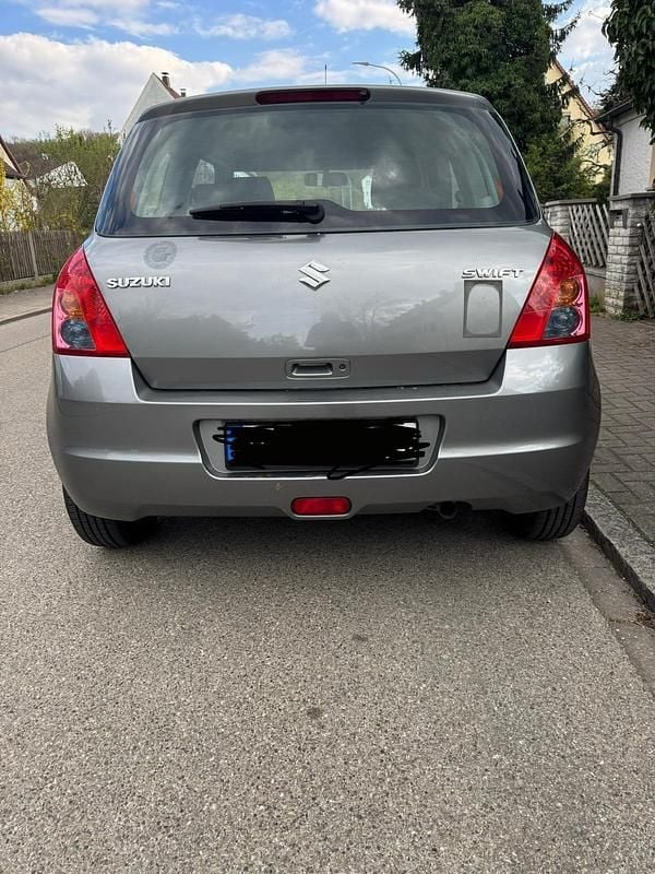 Second-hand Suzuki Swift 92 CP (67 kW) 2009 Gri Hatchback