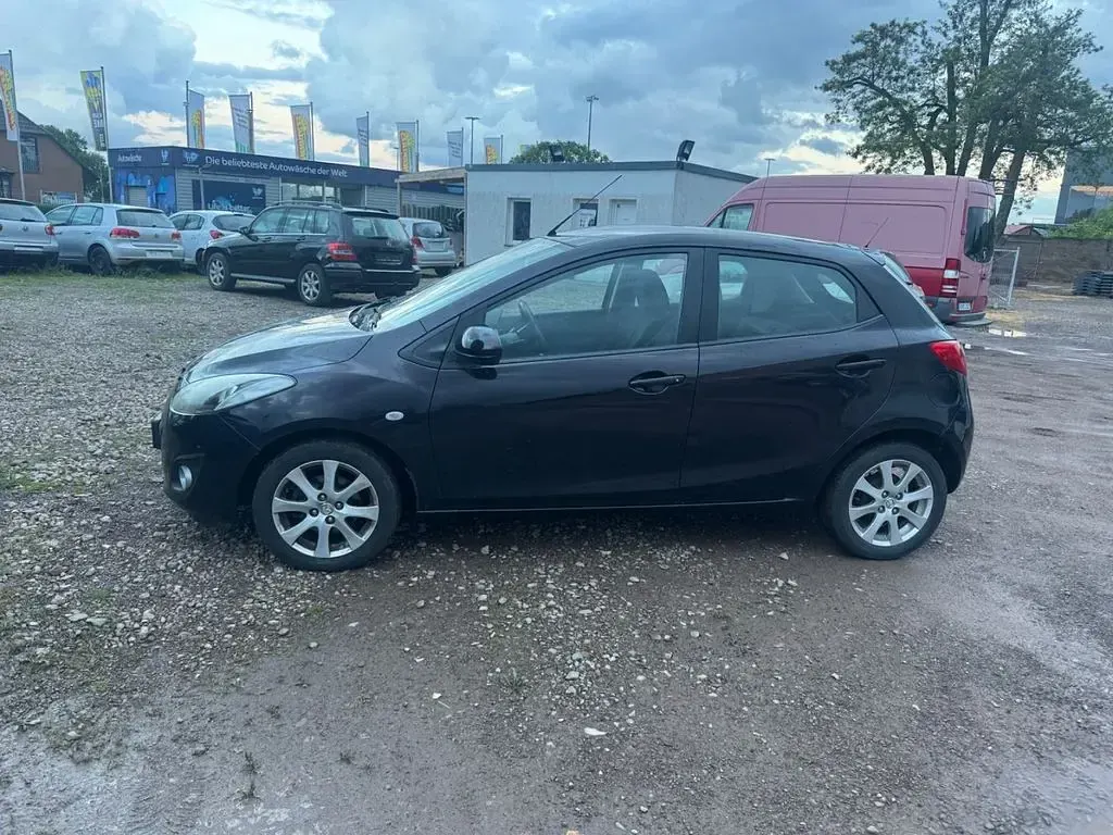 Gebraucht Mazda 2 Active 84 PS (61 kW) 2011 Schwarz Kleinwagen
