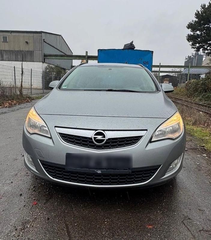 Gebraucht Opel Astra 125 PS (91 kW) 2011 Grau Kombi
