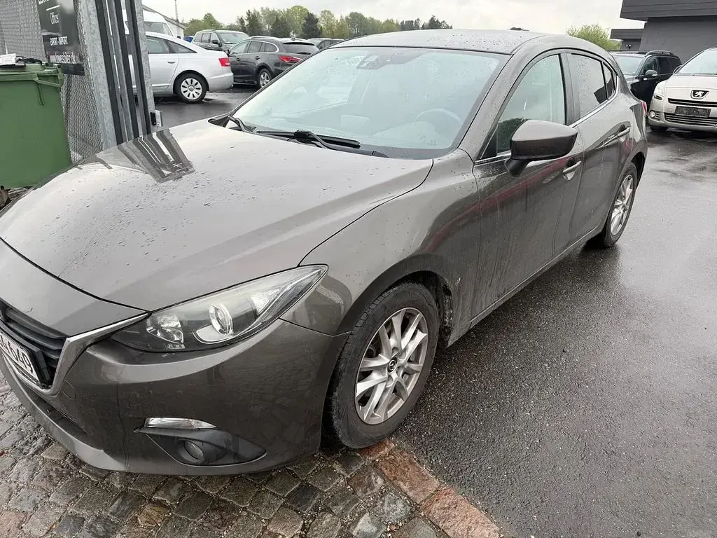 Używany Mazda 3 Center-Line 120 KM (88 kW) 2013 Brązowy Sedan/Limuzyna