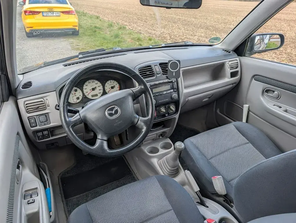 Gebraucht Mazda Demio 75 PS (55 kW) 2002 Schwarz Kleinwagen
