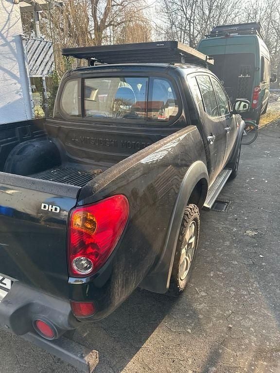 Gebraucht Mitsubishi L200 136 PS (100 kW) 2006 Schwarz Abholung