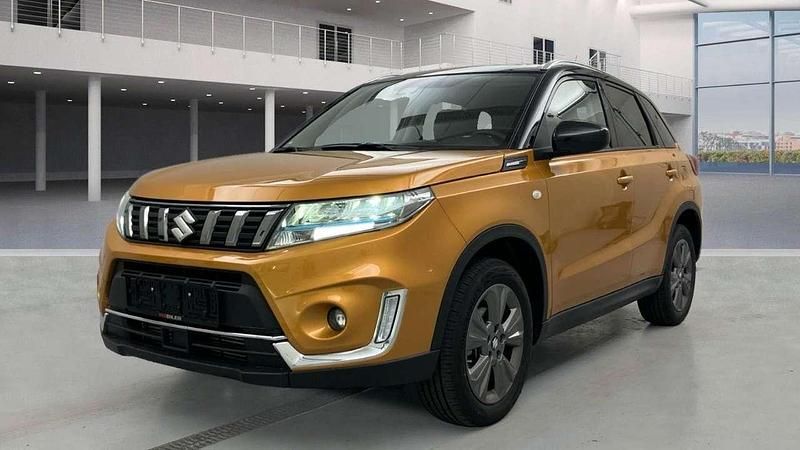 Gelb Gebraucht 2024 Suzuki Vitara Active SUV | 22.850 € (Fairer Preis) - Bild 1/3