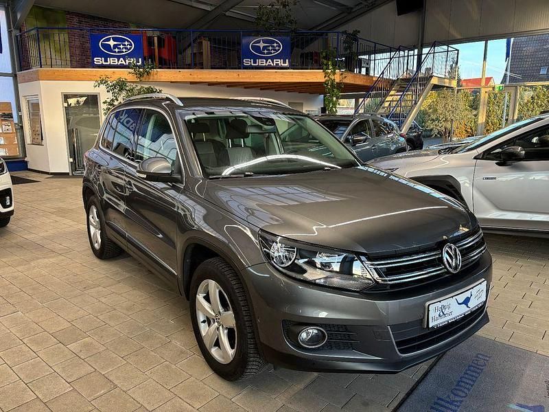 Grau Gebraucht 2012 VW Tiguan Sportline SUV | 10.950 € (Fairer Preis) - Bild 1/4
