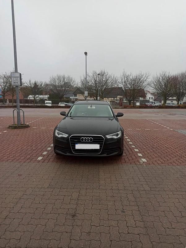 Braun Gebraucht 2012 Audi A6 Kombi | 10.799 € (Guter Preis) - Bild 1/4