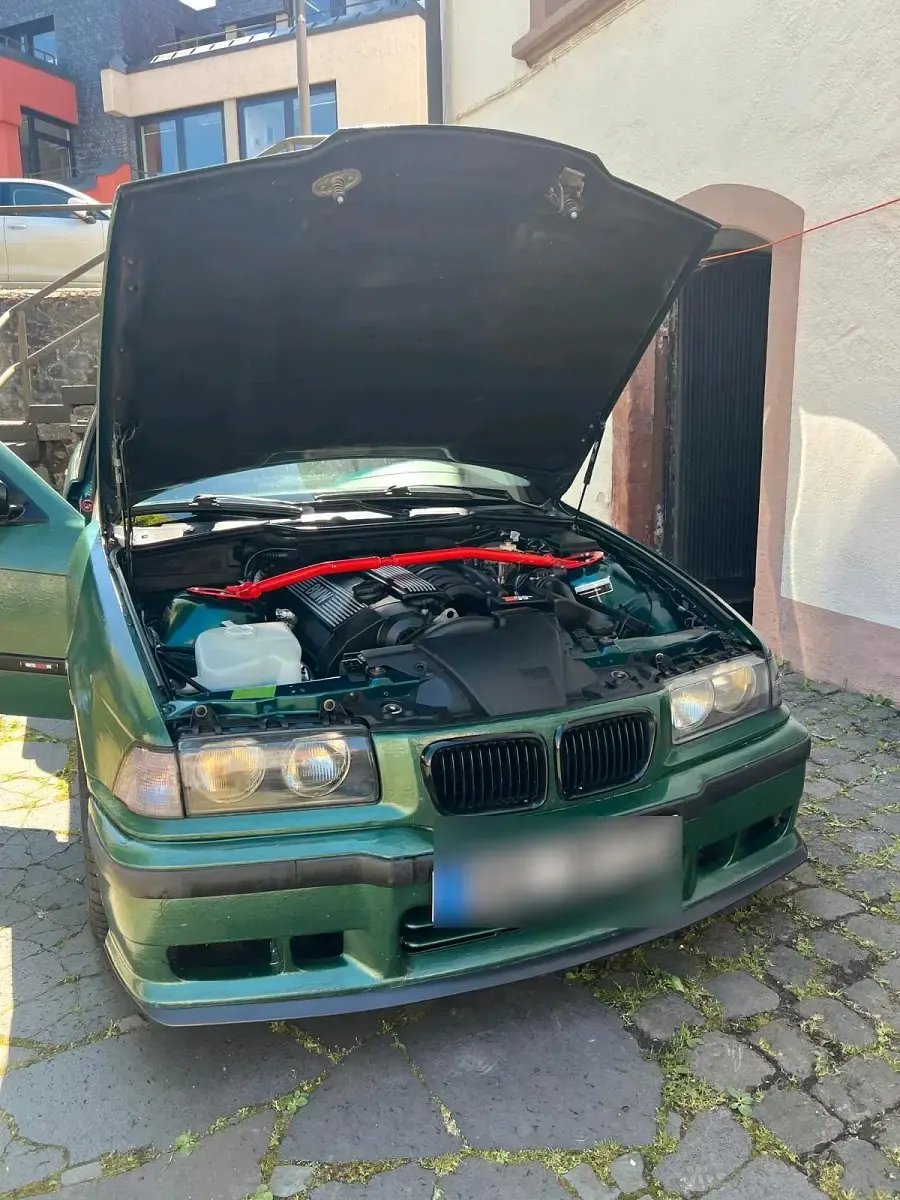 Gebraucht BMW 320 Basis 150 PS (110 kW) 1997 Grün Kombi
