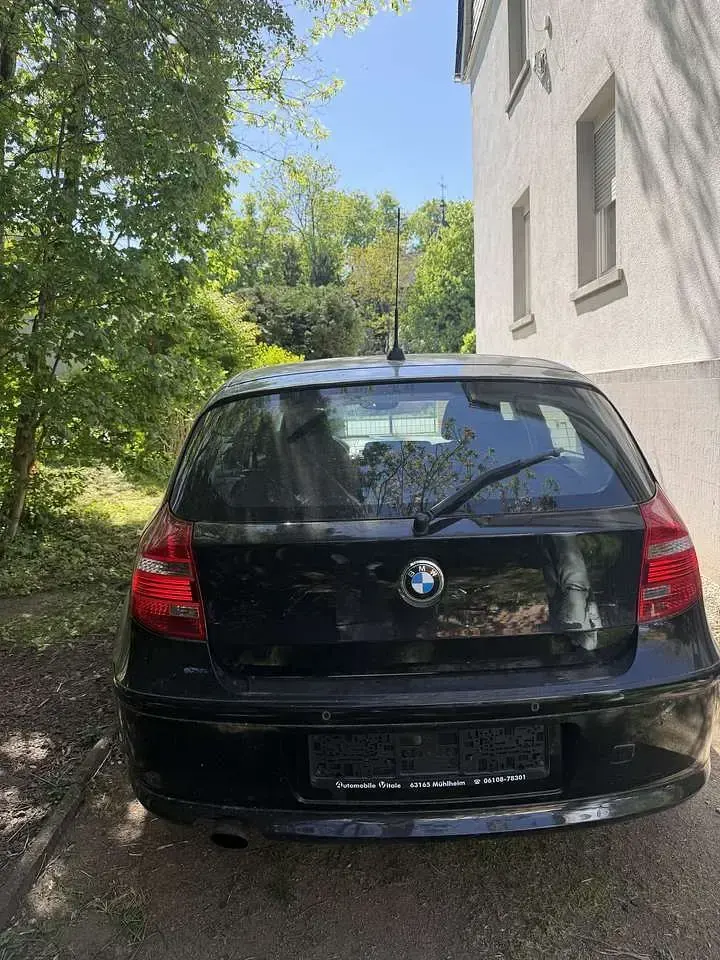 Second-hand BMW 116 122 CP (89 kW) 2007 Negru Hatchback