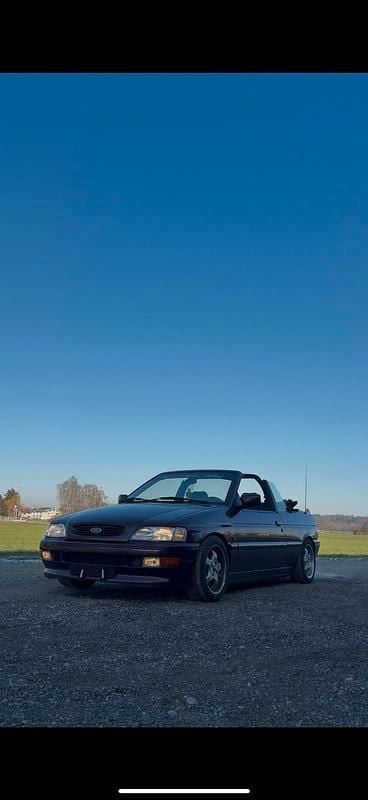 Gebraucht Ford Escort Cabriolet 105 PS (77 kW) 1994 Violet Cabrio