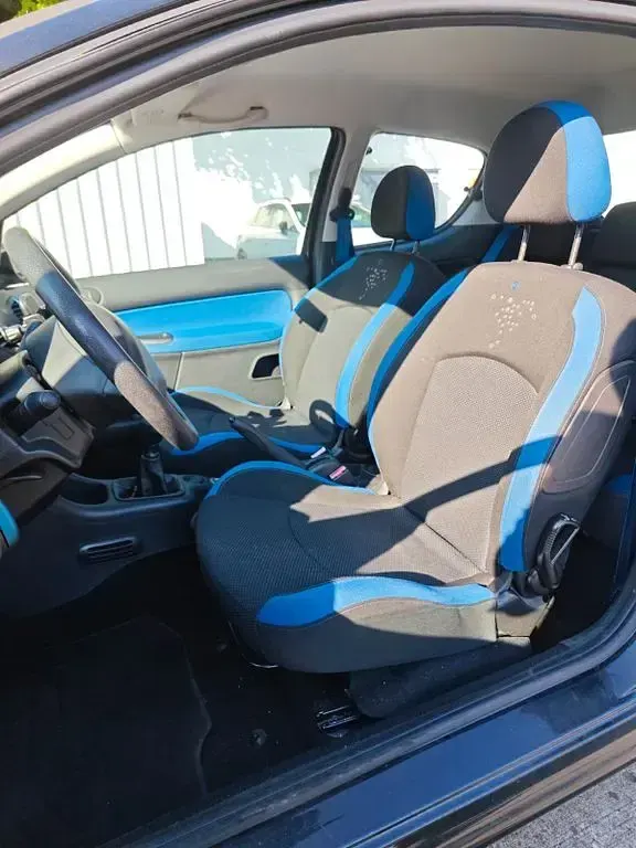 Gebraucht Peugeot 206+ 60 PS (44 kW) 2011 Schwarz Kleinwagen