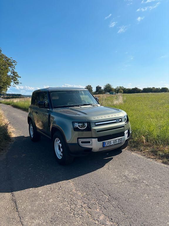 Grün Gebraucht 2023 Land Rover Defender SE SUV | 62.500 € (Superpreis) - Bild 1/4