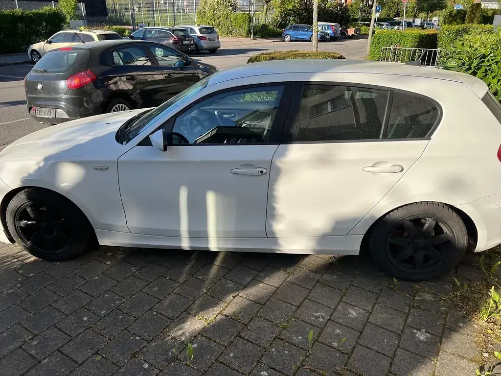 Second-hand BMW 116 Performance 122 CP (89 kW) 2009 Alb Hatchback