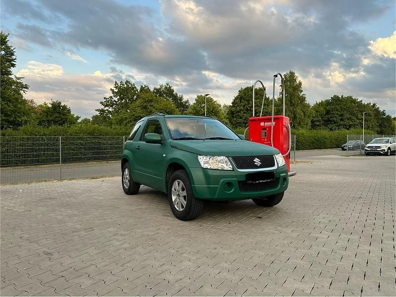 Grün Gebraucht 2006 Suzuki Grand Vitara SUV | 3.999 € (Etwas zu teuer) - Bild 1/4