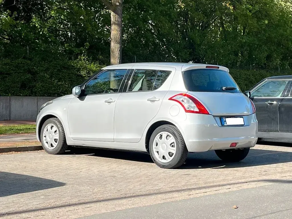 Second-hand Suzuki Swift 94 CP (69 kW) 2013 Gri Hatchback